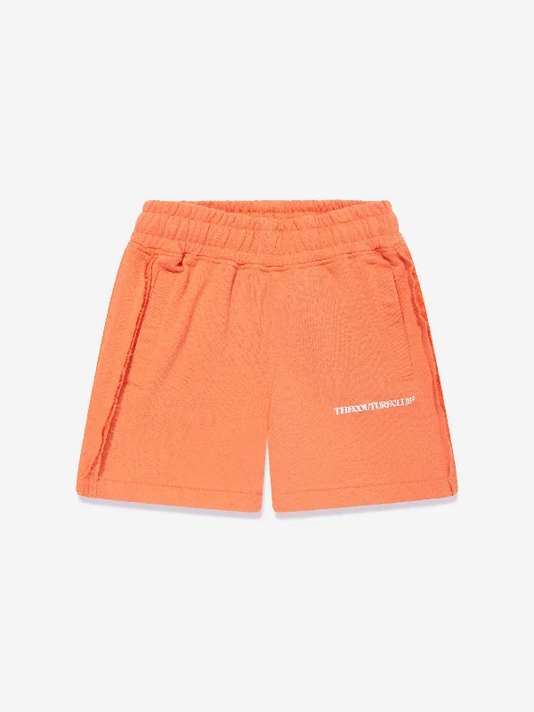 The Couture Club Kids Raw Seam Shorts in Orange